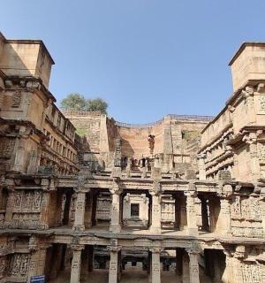 a large stone building with columns and pillars