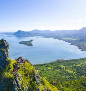 a view of a lake from the top of a mountain