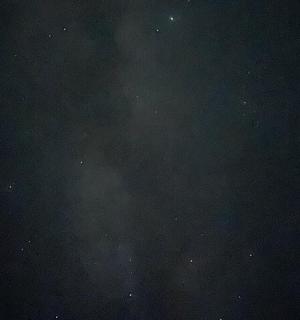 a night sky with a lot of smoke in it