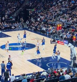 an overhead view of a basketball game in a stadium