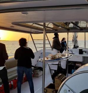 a group of people on a boat in the water