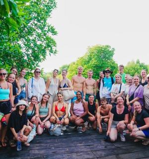 a large group of people posing for a picture