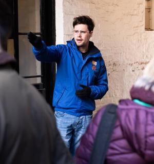 a man standing in front of a group of people