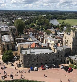 an aerial view of a city with a large building