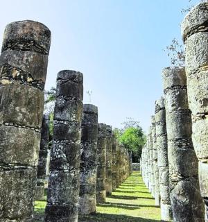 a row of ruins at a temple
