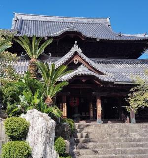a building with stairs in front of a building