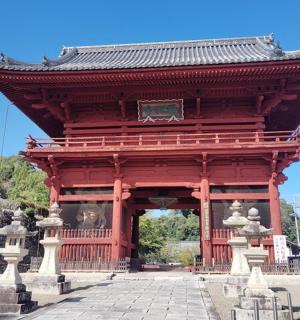a large red building with a roof