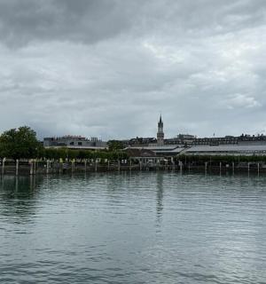 a large body of water with a city in the background