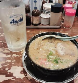 a bowl of soup sitting on top of a table
