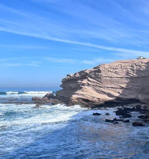 a view of the ocean from a cliff