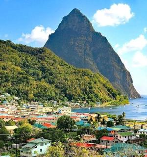 a view of a town with a mountain in the background