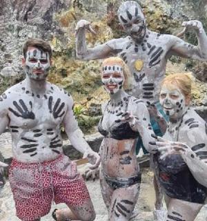 a group of people dressed up as zombies in the water