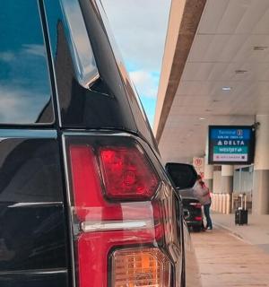 a car is parked at a gas station