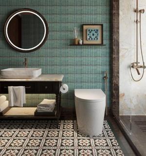 a bathroom with a sink and a toilet and a mirror