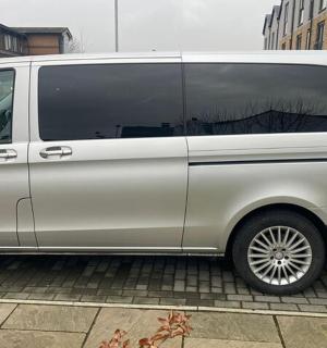 a white van parked in a parking lot
