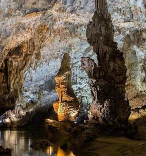 a cave with some water and some rocks
