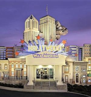 a view of the wax museum with a city skyline