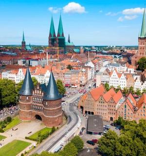 an aerial view of a city with tall buildings