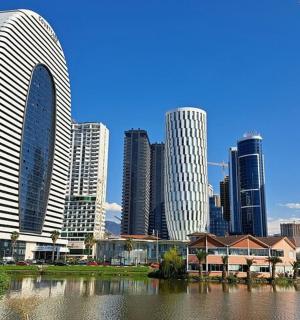 a view of a city with tall buildings