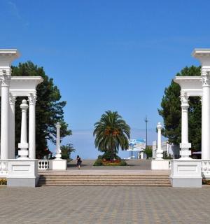 a large white building with columns and a staircase
