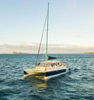 a group of people on a boat in the water