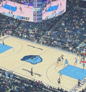 an overhead view of a basketball court in a stadium