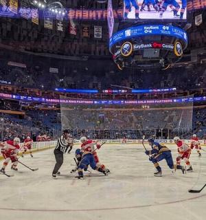 a hockey team on the ice in a arena