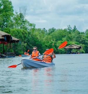 two people in a boat on a body of water