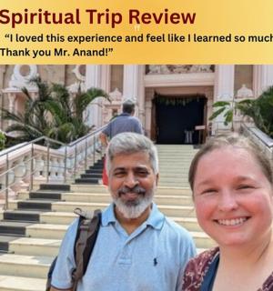 a man and a woman standing in front of some stairs