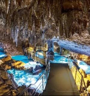 a view of a water slide in a cave