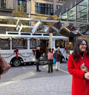 a group of people standing in front of a food truck