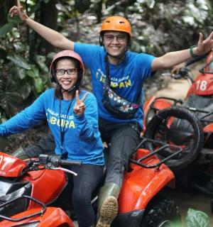 a group of people riding on motorcycles in the jungle