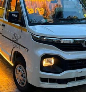 a white van is parked on a street