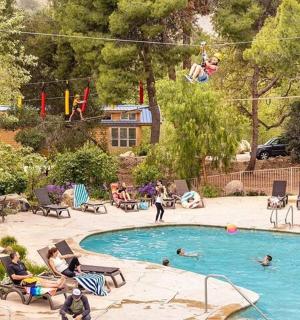 a group of people playing in a swimming pool