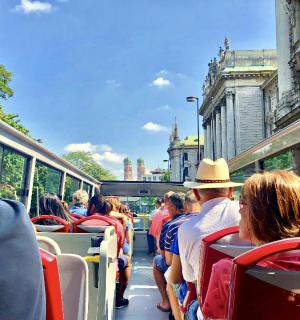 a group of people sitting on a bus