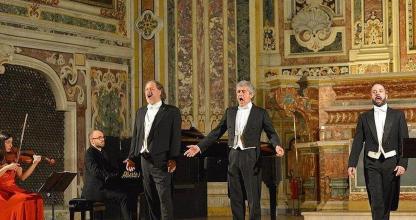 three men in suits walking in a room with a orchestra