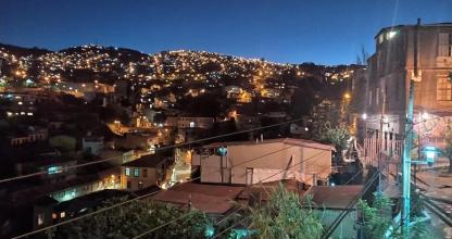 a view of a city at night with lights