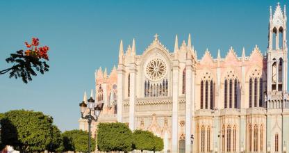 a large cathedral with a large white building