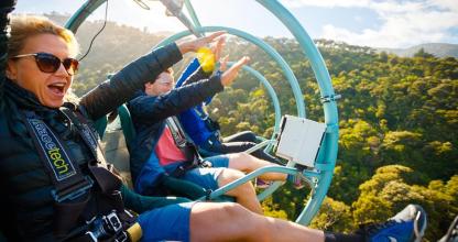 a group of people riding on a gondola
