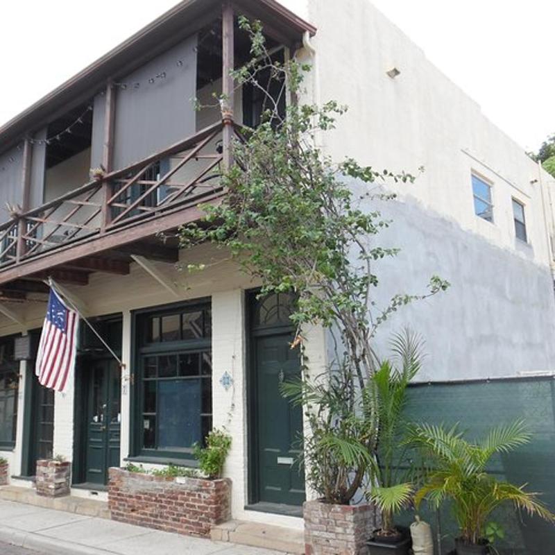 a building with an american flag in front of it