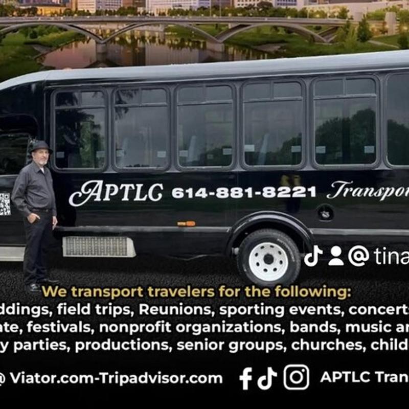 a man is standing in front of a bus