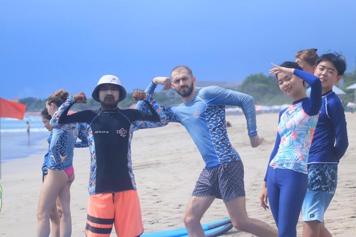 a group of men standing on a beach