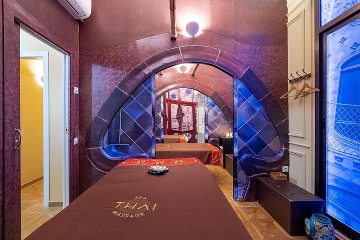 a room with a bed and a room with a tunnel