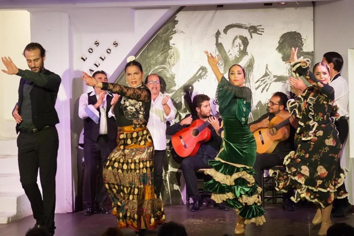a group of people dancing on a stage with instruments