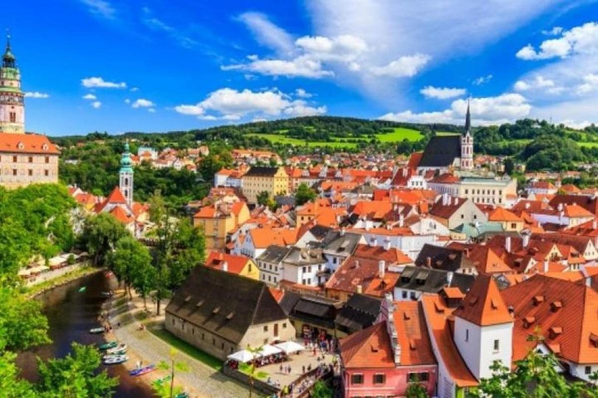 a view of a town with red roofs