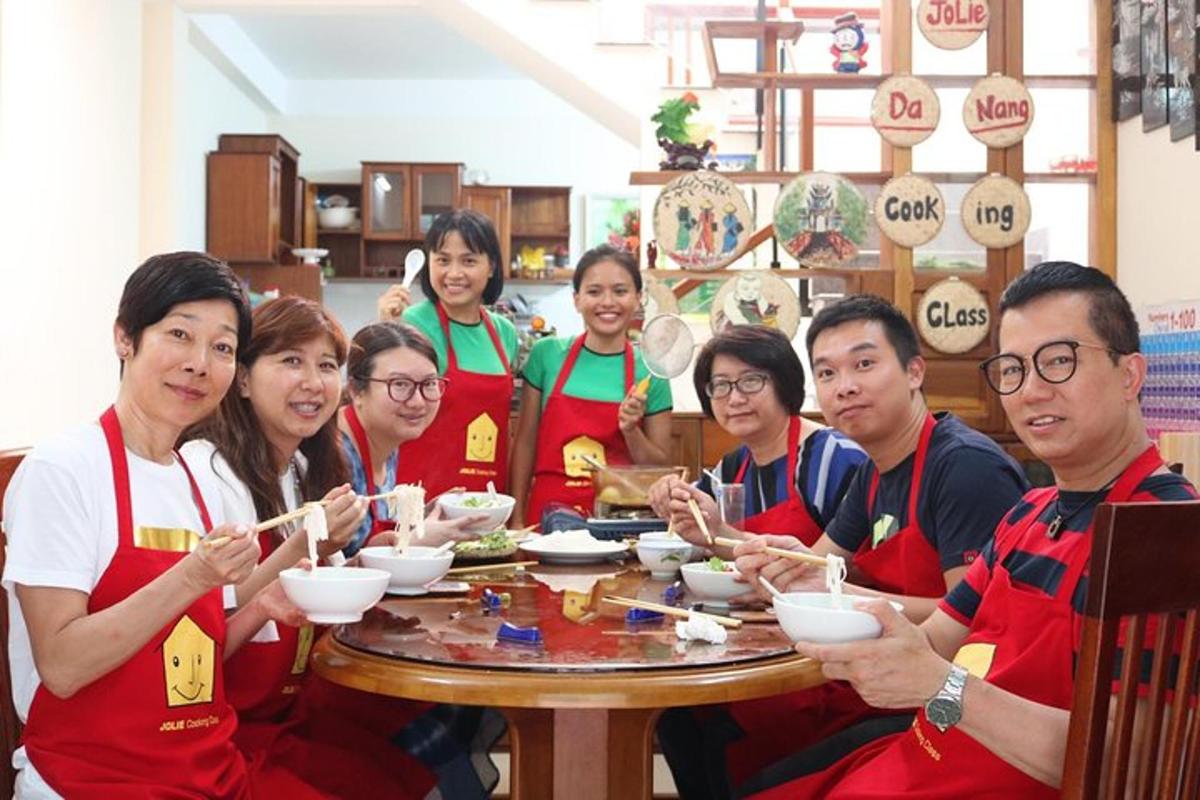 a group of people sitting around a table eating food