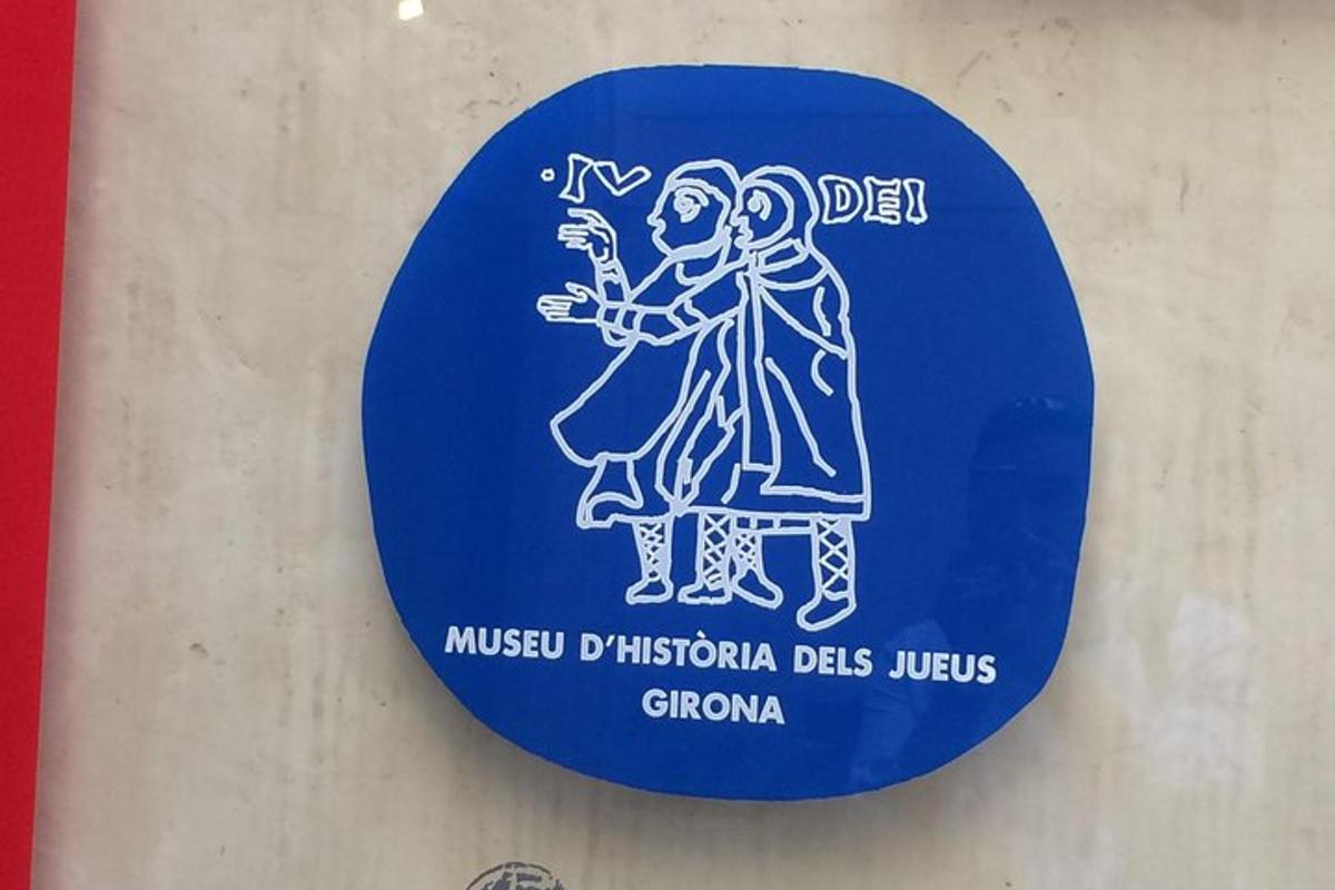 un rètol blau amb la imatge d'una persona