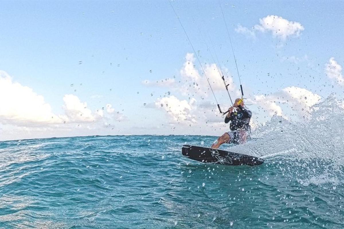 a man on a surfboard in the water
