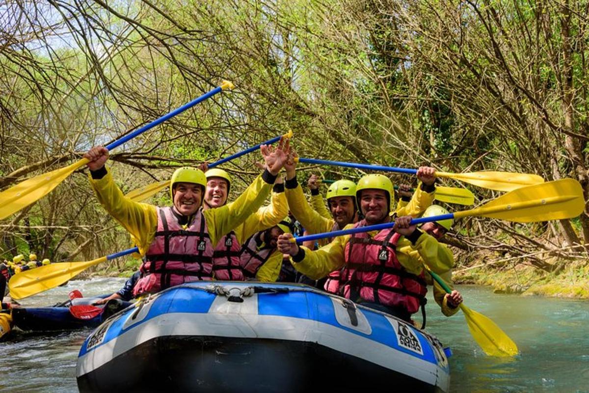 a group of people in a raft on a river