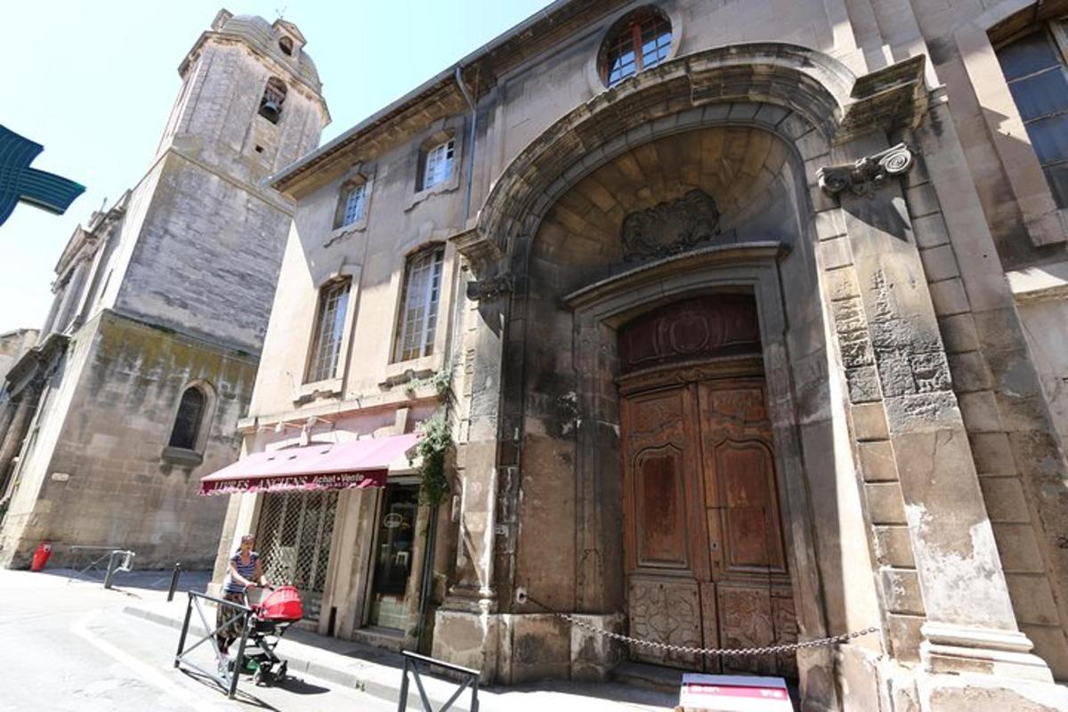 a building with a large wooden door in front of it